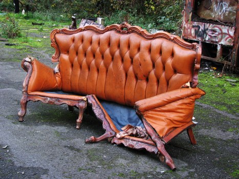 Front view of commercial waste collection vehicle in Potters Bar near recycling bins